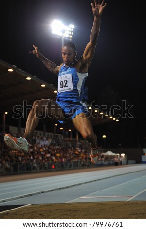 TURIN, ITALY - JUNE 25: Andrew Howe performs a long jump during the 2011 Summer Track and Field Italian Championship meeting on June 25, 2011 in Turin, Italy.