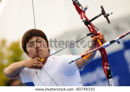 TURIN, ITALY - JULY 10:  KIM Woojin (KOR), 2011 recurve men world champion, competes at the 2011 World Archery and Para Archery Championships , on June 10, 2011 in Turin, Italy.