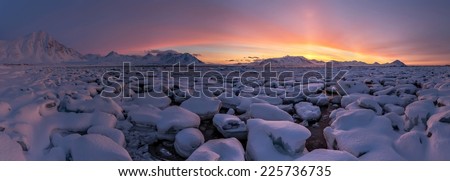 Arctic sunrise panorama - glacier ice and snow