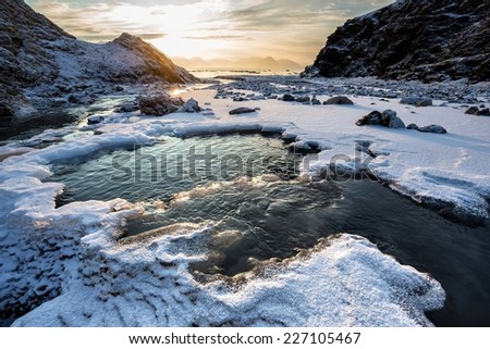 Arctic landscape - freezing river - Spitsbergen, Svalbard