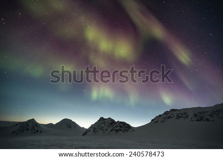 Polar night with Northern Lights on the sky - Arctic landscape