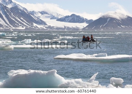 Arctic landscape, people on the boat