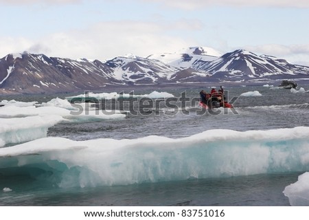 Arctic landscape - People on the boat - Spitsbergen
