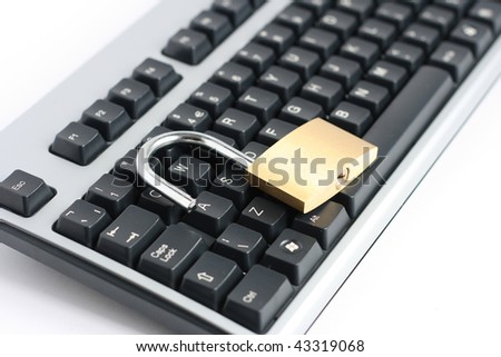 unlocked open padlock with computer keyboard