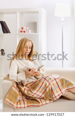beauty girl reading book in the room