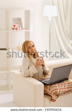 beauty girl with laptop in the room