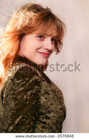 portrait of young woman with coat (back lighting)