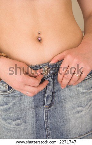 woman - jeans, belly button and hand