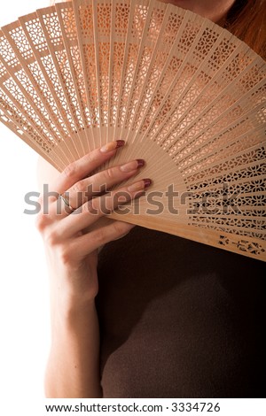 young woman with fan isolated on white