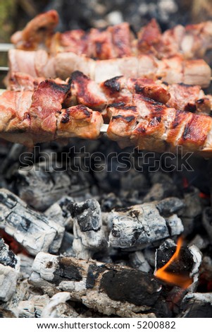 close up photo of cooking meet on the open fire