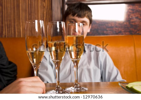Good merry company drinking wine in restaurant