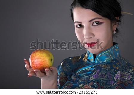 young beauty japanese girl with red apple