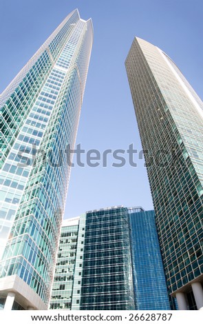 Two skyscrapers going into the blue sky