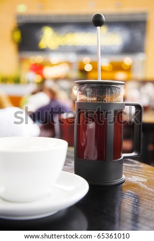 French coffee press with freshly brewed coffee