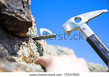 climbing iron and climbing hammer with in the rock