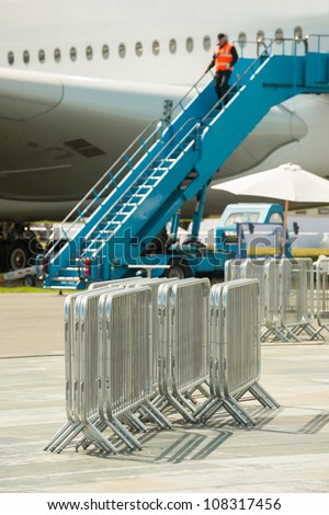 fencing barriers used to control the flow of passengers at an airport
