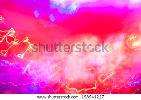 random light motion blur on a red background