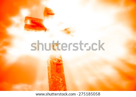 crucifixion of Jesus with dramatic sky background