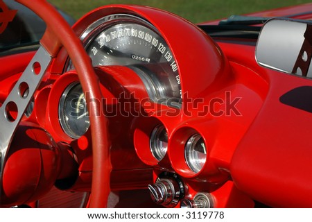 stock photo red dashboard on vintage sports car