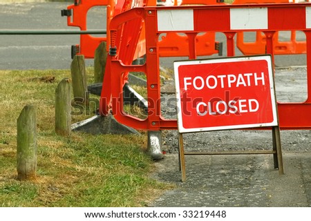 footpath closed by road maintenance  barrier sign
