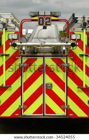 emergency fire truck loaded with rescue ladders