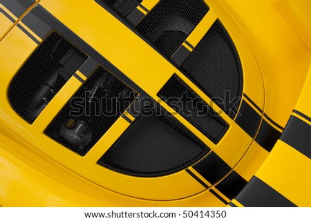 yellow and black luxury sports car abstract