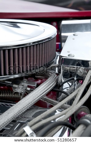 closeup of engine parts on a performance car