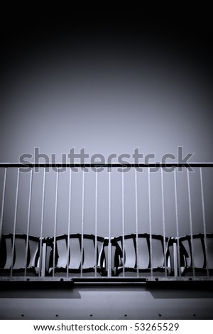 bleacher seating and safety rail abstract