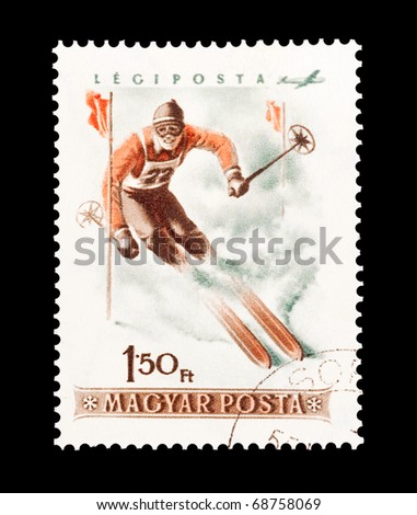 HUNGARY - CIRCA 1955: mail stamp printed in Hungary featuring winter sport slalom skiing, circa 1955

one from a themed set of eight