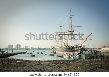 PORTSMOUTH, UK - FEBRUARY 1: HMS Warrior, the first iron-clad battleship launched by the British Royal in 1860, is now a floating museum and is moored in Portsmouth, UK - February 1, 2012
