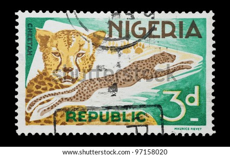 NIGERIA - CIRCA 1965: Mail stamp printed in Nigeria featuring a leaping cheetah big cat, circa 1965