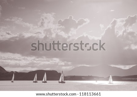 Sailing Boats off Oban in front of the Isle of Kerrera, Scotland in Black and White, Sepia Tone