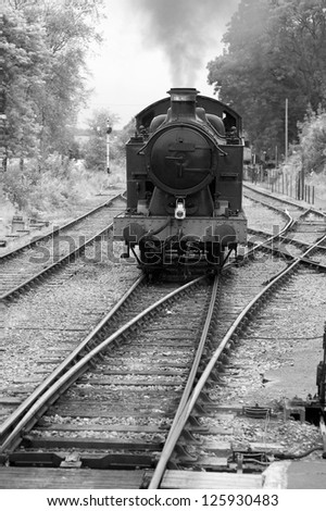 Old Steam Train Engine in Black and White Sepia Tone
