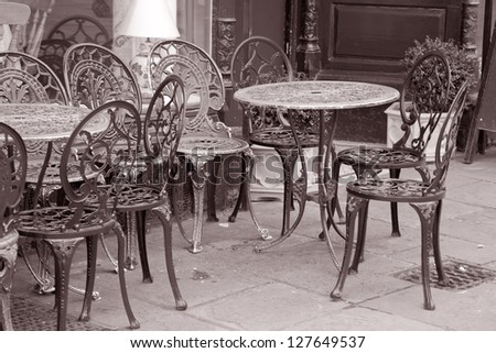 Cafe Table and Chairs in Black and White Sepia Tone
