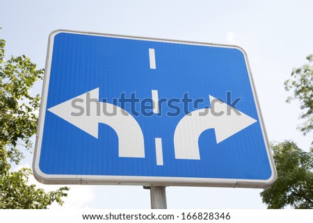 Traffic Sign with Two Arrows Pointing in Different Directions