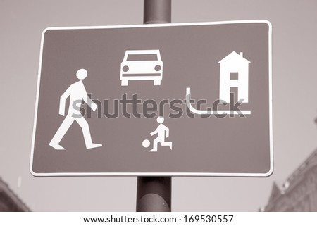 Pedestrian Area Sign in Urban Setting With Blue Sky Background
