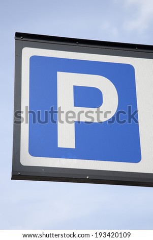 Blue Parking Sign in Urban Setting