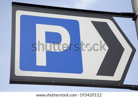 Blue Parking Sign in Urban Setting