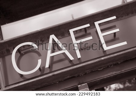 Cafe Sign on Diagonal Slant in Black and White Sepia Tone