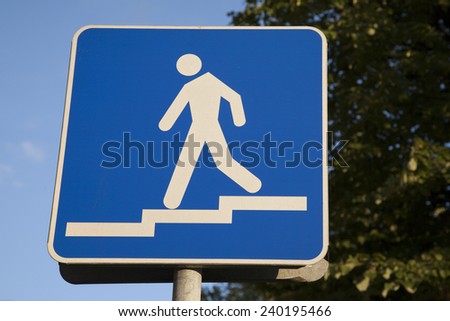 Pedestrian Sign of Man Walking Down Steps