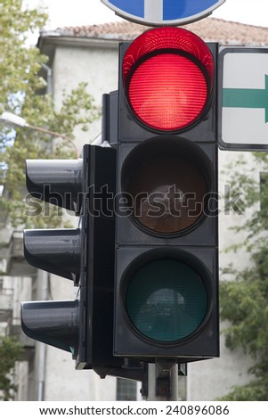 Red Traffic Light in Urban City Centre