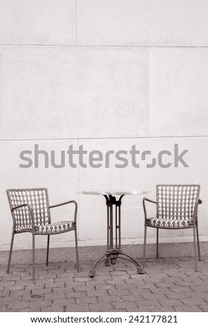 Cafe Table and Chair in Black and White Sepia Tone