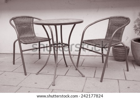 Cafe Table and Chair in Black and White Sepia Tone
