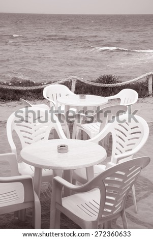 Cafe Table and Chairs, Formentera, Balearic Islands, Spain in Black and White Sepia Tone