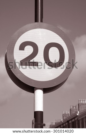 Twenty Speed Sign in Urban Setting in Black and White Sepia Tone