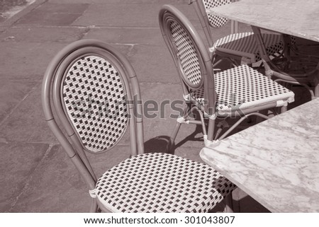 Cafe Table and Chairs, Paris, France in Black and White Sepia Tone