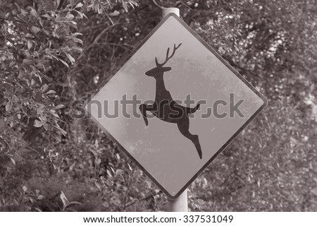 Dimond Shaped Deer Sign in Black and White Sepia Tone