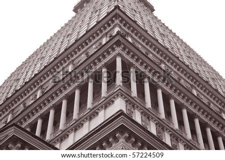 A closeup of the Mole Antonelliana Building in Turin in black and white sepia