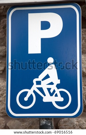 Blue Parking Sign for Bicycles in Urban Setting