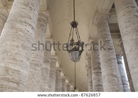 Famous Colonnades designed by Bernini leading to St Peters Basilica in St Peters Square, Vatican City, Rome